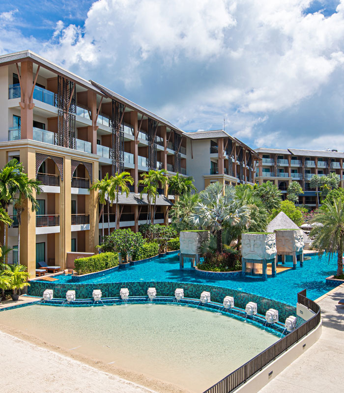 Swimming pools and guest-room balconies at Rawai Palm Beach Resort